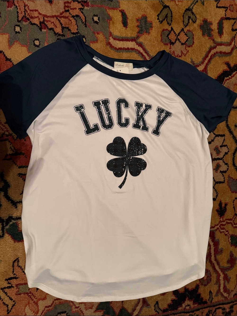 Lucky Brand adult White Tee with navy/black Raglan Sleeves and Clover Graphic